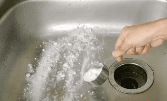 Sprinkle Baking Soda all over the Sink